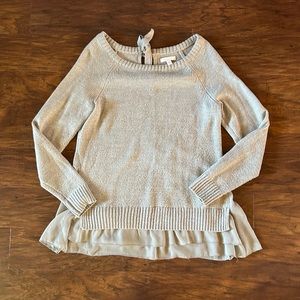 Grey sweater with ruffle at the bottom
